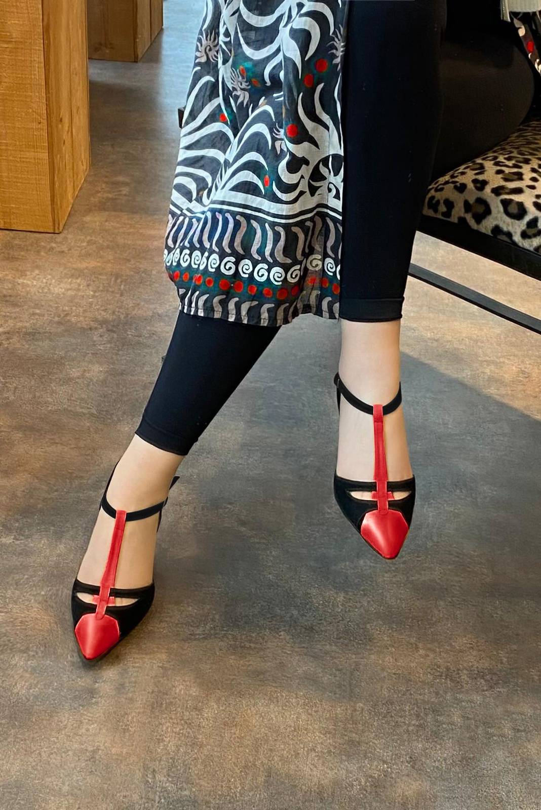 Scarlet red and matt black women's T-strap open side shoes. Tapered toe. Medium flare heels. Worn view - Florence KOOIJMAN
